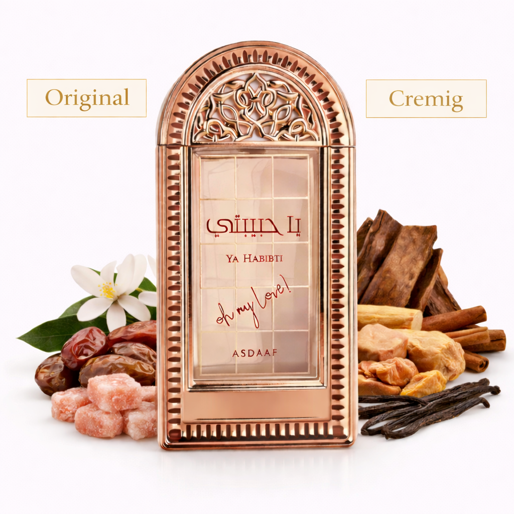 Eleganter Parfumflakon in roségoldenem, orientalisch verziertem Rahmen mit der Aufschrift „Ya Habibi – Asdaaf“. Das Produkt ist mittig vor weißem Hintergrund platziert, flankiert von Datteln, rosa Zuckerkristallen, weißer Blüte sowie Vanilleschoten, Zimtstangen und Holzstücken, die die cremig-süße Duftnote symbolisieren. 